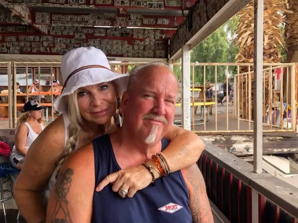 Kimber and Darrell Sheets embracing.