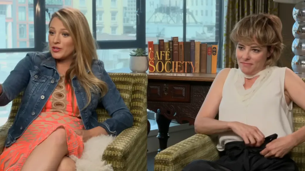 Blake Lively and Parker Posey sitting in chairs, with 