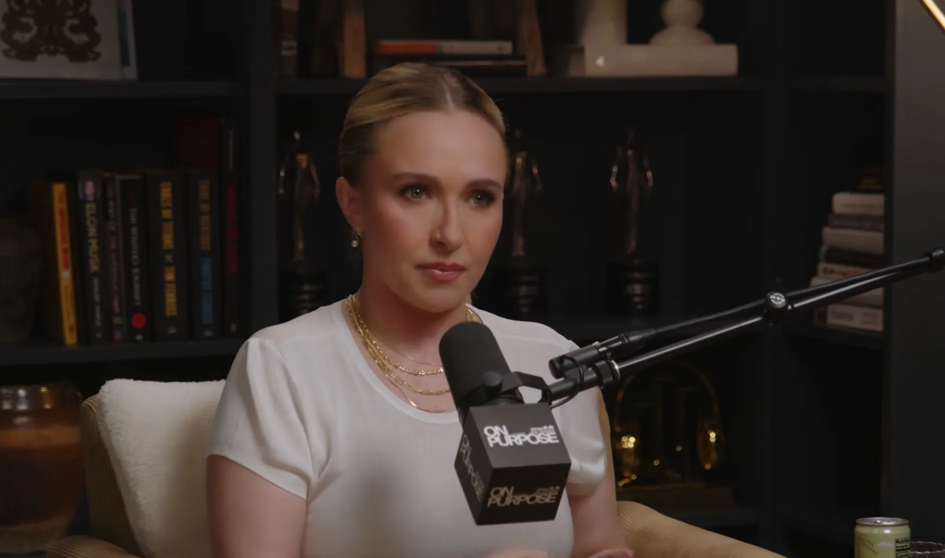 Hayden Panettiere speaking into a microphone on Jay Shetty's podcast.