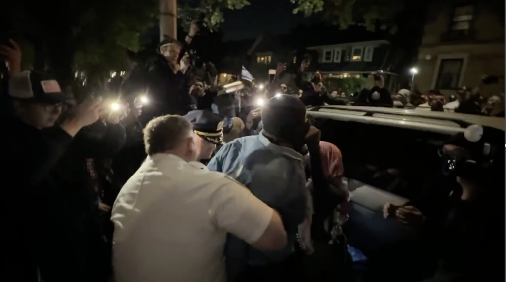 At least three people were detained after agitators swarmed the area near the Young Israel Senior Services of Midwood, which was hosting an event promoting real estate in Israel and the West Bank.