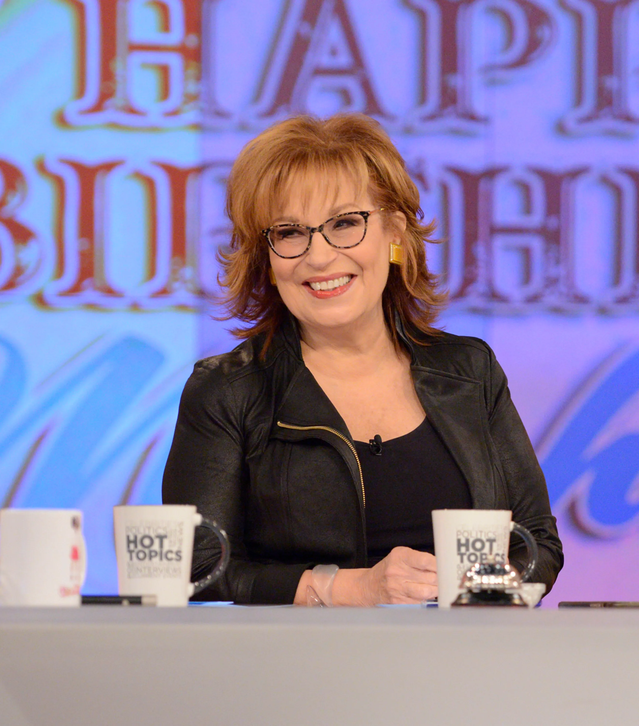 Joy Behar smiling on the set of