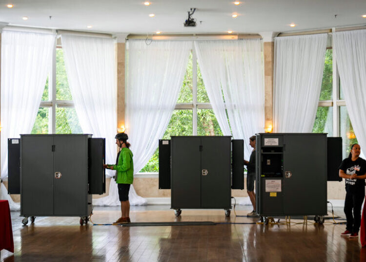 Georgia Delays Change to Its Vote-Counting System