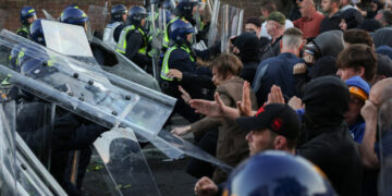 U.K. Protests Over Murder Case Turn Violent, as Leaders Urge Calm