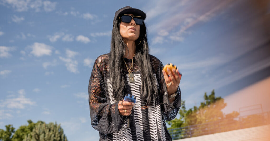 This Stylish Track Coach Won’t Change for Her ‘Haters’