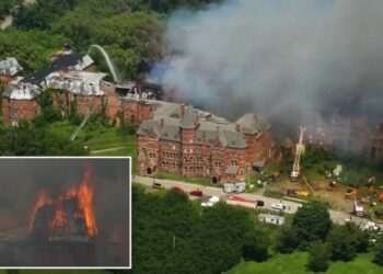 Massive inferno tears through historic New York psychiatric center