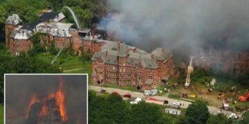 Massive inferno tears through historic New York psychiatric center