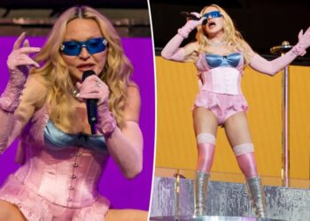 Madonna, 67, shocks in skintight pink corset at surprise NYC Times Square concert