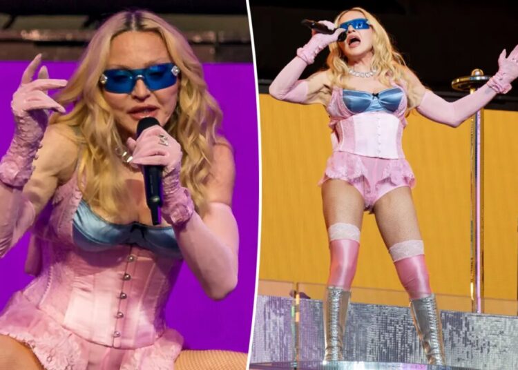 Madonna, 67, shocks in skintight pink corset at surprise NYC Times Square concert