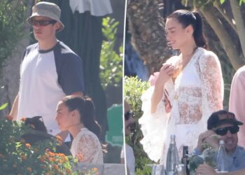 Dua Lipa radiates bridal vibes in white lace dress following wedding to Callum Turner