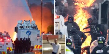 Police blast water cannons at Belfast protesters as unrest flares again after stabbing