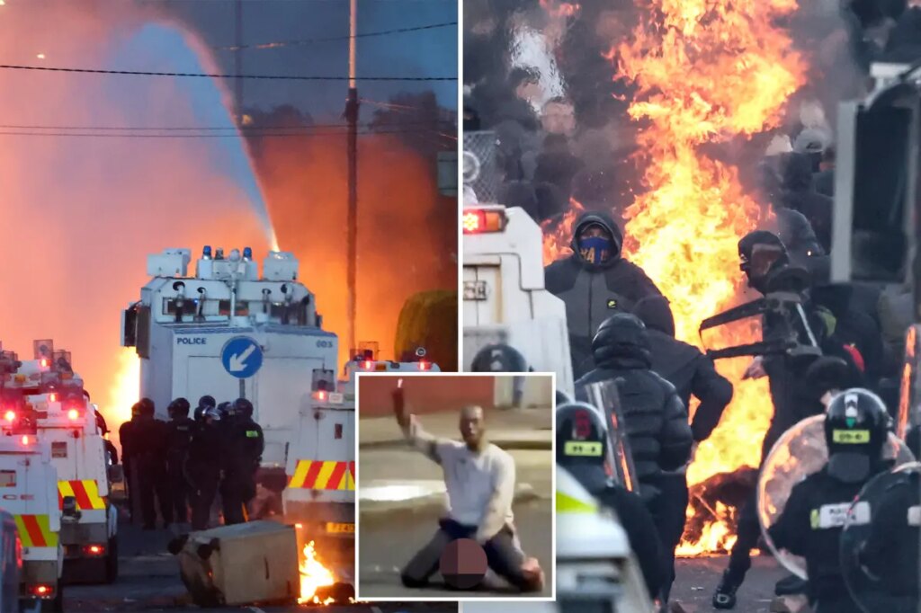 Police blast water cannons at Belfast protesters as unrest flares again after stabbing