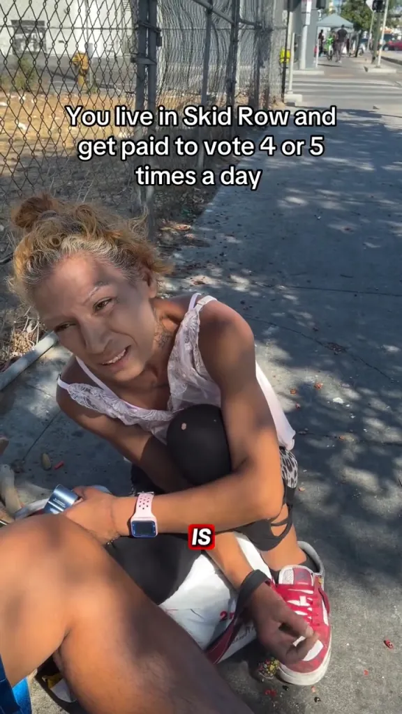 A person in a white top sits on the ground, with text overlaid that reads: