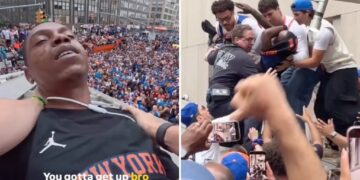 Chaotic moment Knicks fans climb structure to save reveler from apparent overdose during championship parade