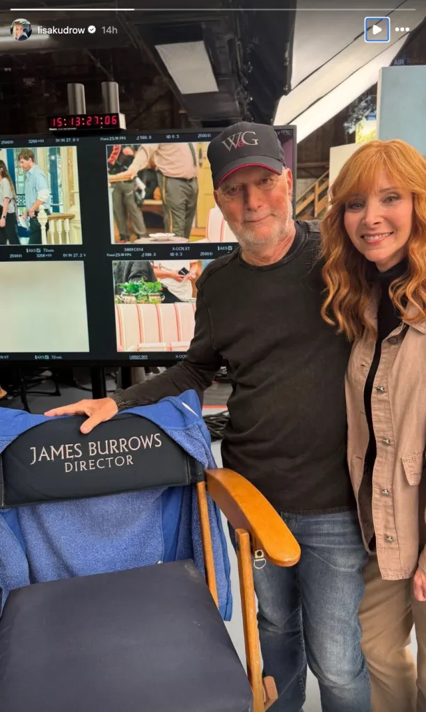 Lisa Kudrow and James Burrows on a set with a director's chair and monitors displaying production footage.