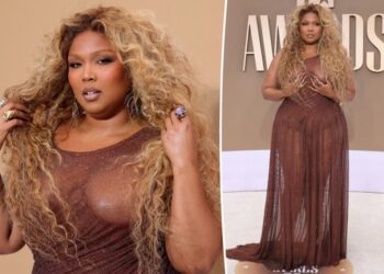 Lizzo goes daringly bare in sheer brown dress for BET Awards