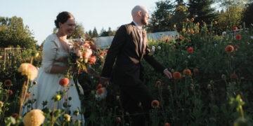 A Wedding Surrounded by Rows of Blooms