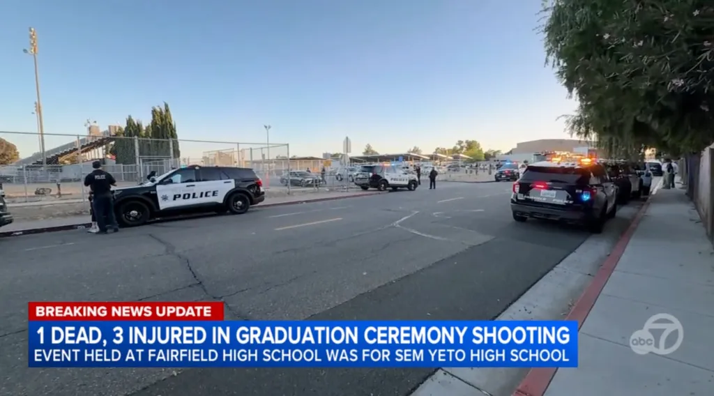 Police cars and officers gathered at the scene of a shooting outside Fairfield High School.
