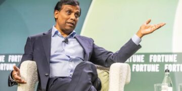 Cognizant CEO is swimming against the tide on AI: he’s hiring over 20,000 graduates this year and says AI tokenmaxxing is a ‘vanity metric’