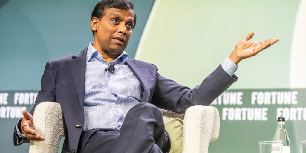 Cognizant CEO is swimming against the tide on AI: he’s hiring over 20,000 graduates this year and says AI tokenmaxxing is a ‘vanity metric’