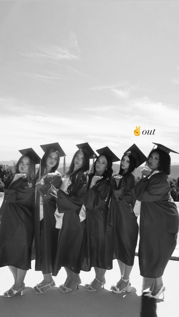 Six women in graduation caps and gowns blowing kisses to the camera.