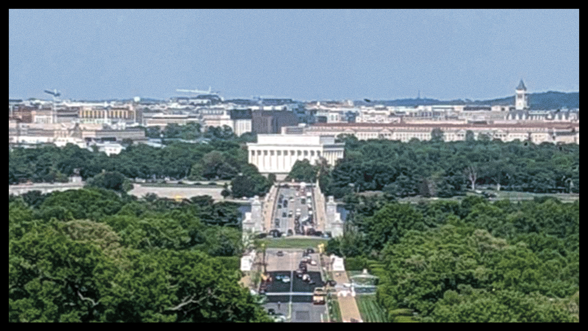 An animated color GIF showing the proposed arch obscuring the view of the Lincoln Memorial.