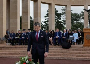 During D-Day speech in France, Hegseth invokes immigration and says ‘When will European capitals do something about that invasion?’