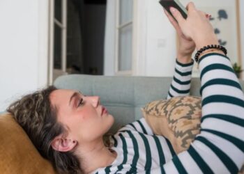 Gen Z hiring manager says CEOs are right about her generation’s ‘attitude’ problem after a candidate took the interview from her phone