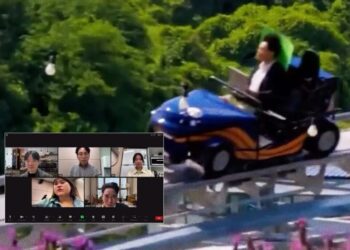 Man Attends Video Meeting From Active Roller Coaster