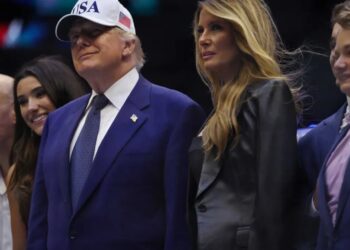 Trump caught smiling after UFC fighter drops shocking remark about Michelle Obama: report