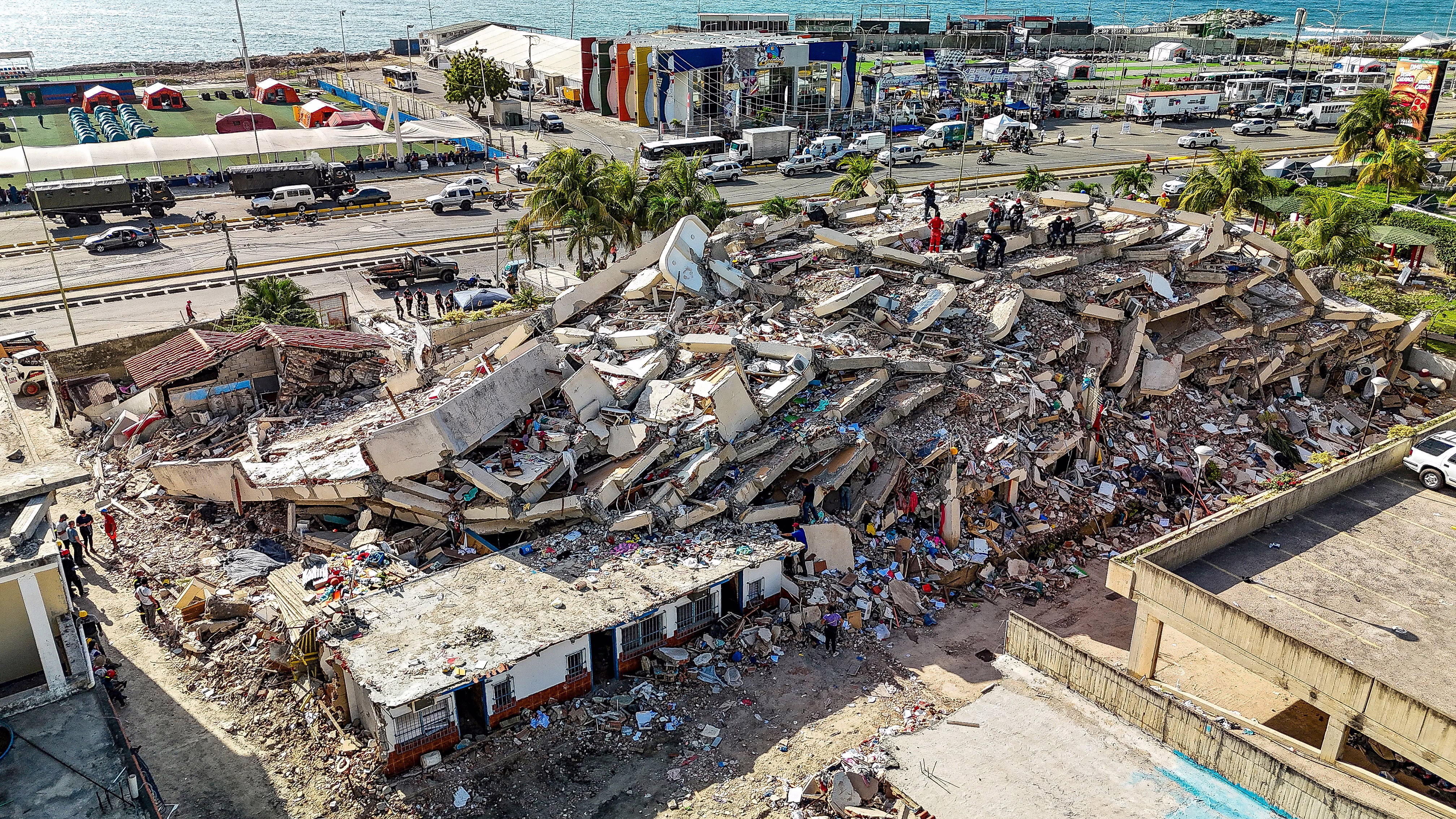 An aerial view of an earthquake-collapsed building.