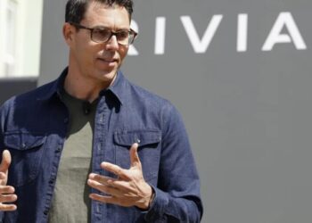 Why Rivian CEO RJ Scaringe wants his EV company to be compared to Apple, not Tesla