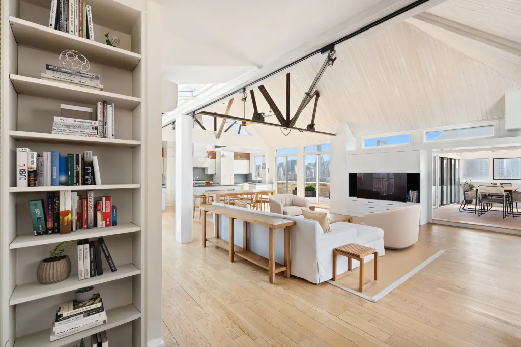 Inside, the living and dining areas come with sky high views