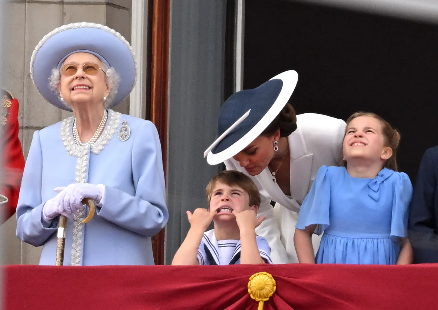 Queen Elizabeth II, Catherine, Duchess of Cambridge, Prince Louis, and Princess Charlotte at Trooping the Colour 2022.