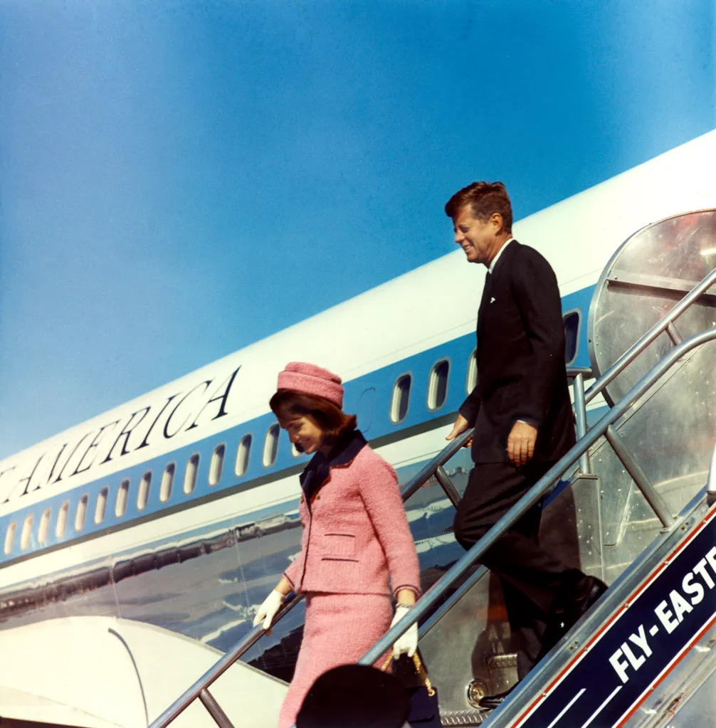 President John F. Kennedy and First Lady Jacqueline Kennedy deplaning Air Force One at Love Field in Dallas, Texas.