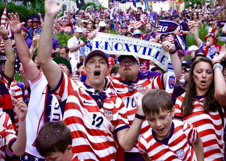 Chanting and Celebrating, U.S. Soccer Fans March to the Match