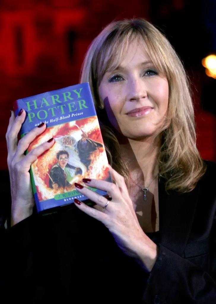 J.K. Rowling holding the 