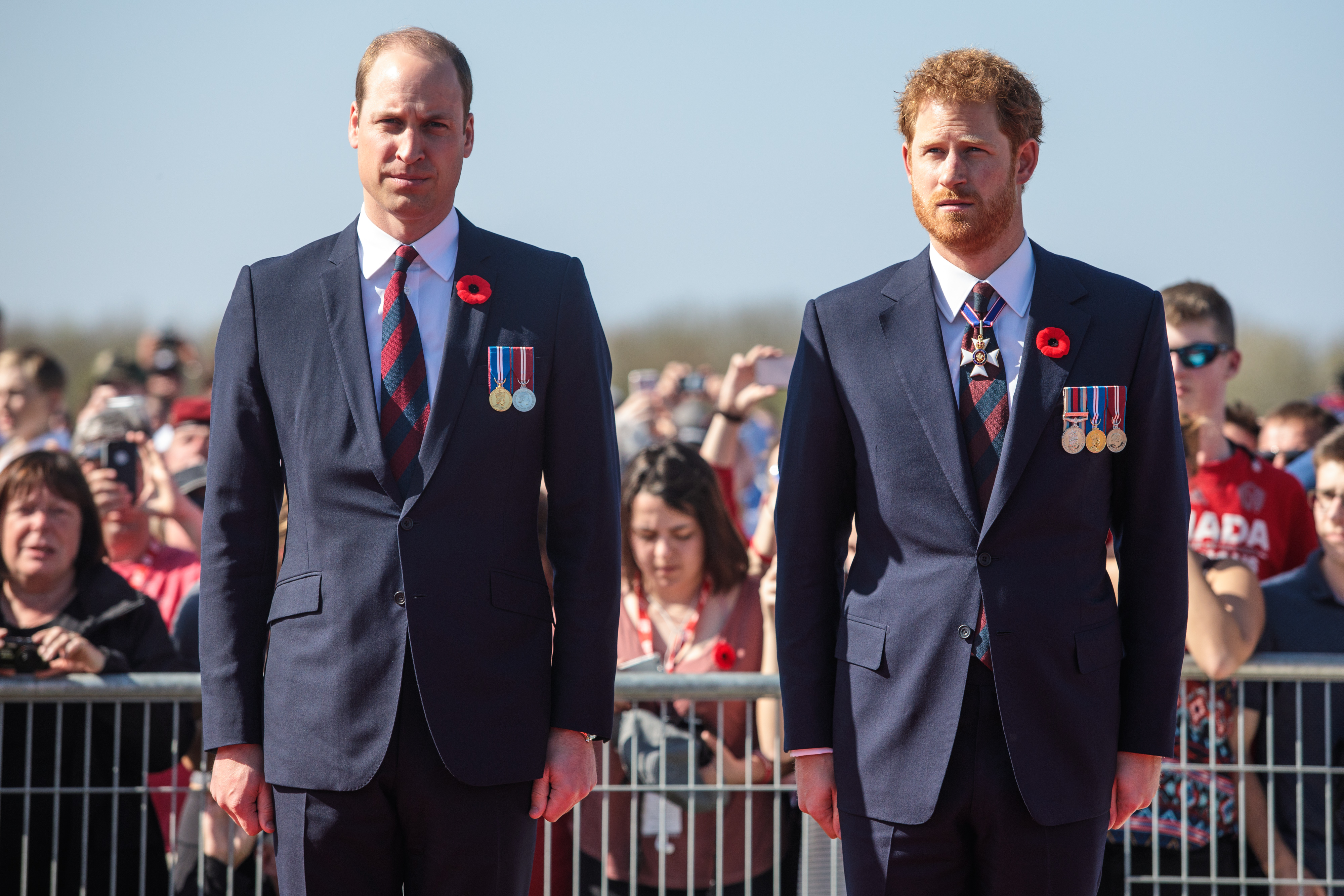 Prince William and Prince Harry standing side-by-side at a centenary commemorative service.