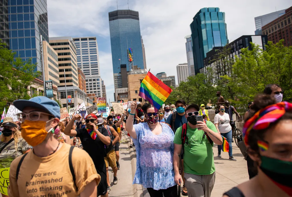Minneapolis protesters walk during a Pride and Black Lives Matter march on June 28, 2020.