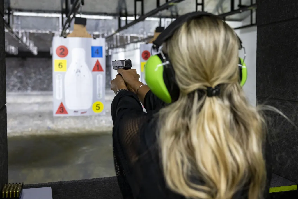 A participant uses a handgun during a training session at a shooting range in Pompano Beach, Florida, US, on Wedne
