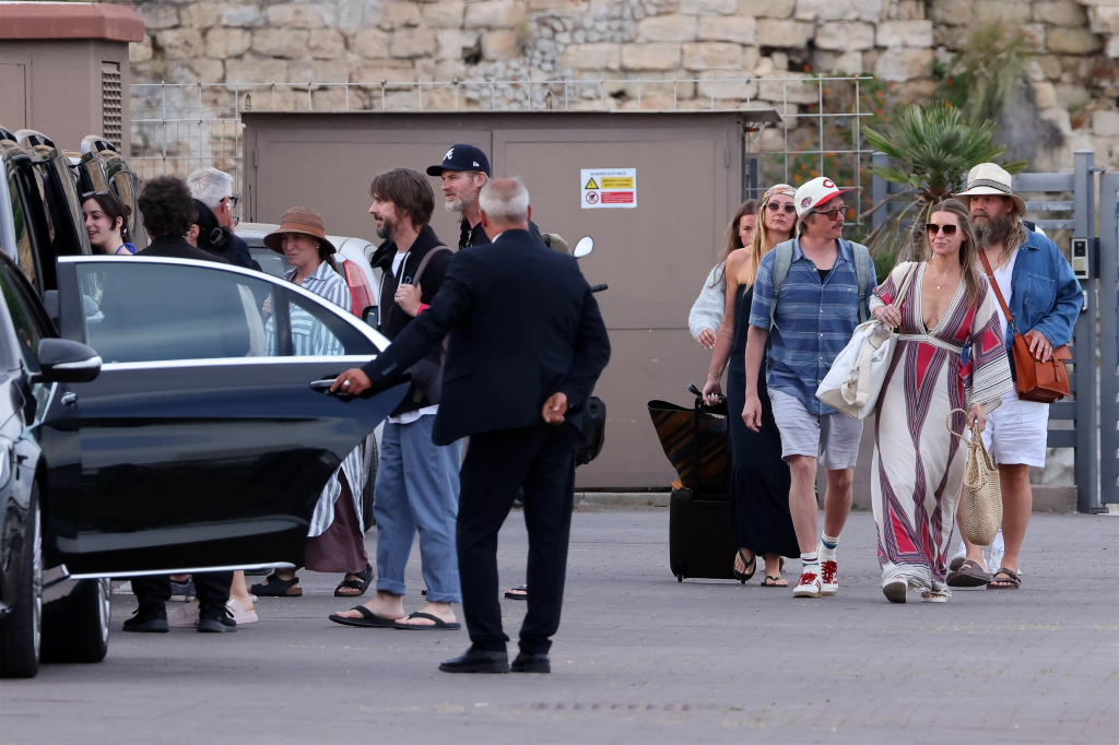 Chris Stapleton, Morgane Stapleton, Dave Cobb, and Richard Collins attend Dua Lipa and Callum Turner's wedding weekend in Italy