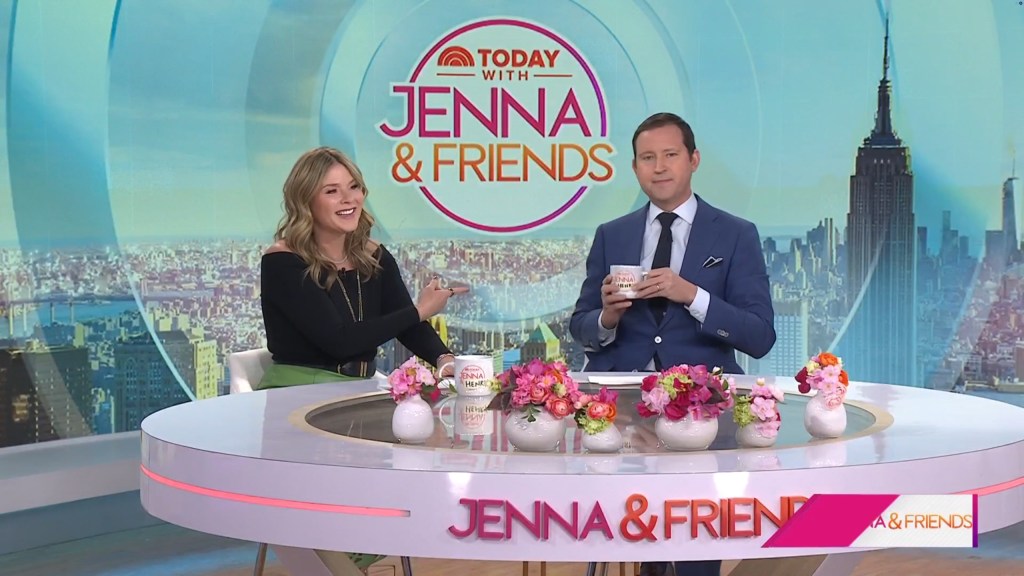 Jenna Bush Hager, in a black top and green skirt, and Henry Hager, in a blue suit, black tie and white shirt, co-hosting 