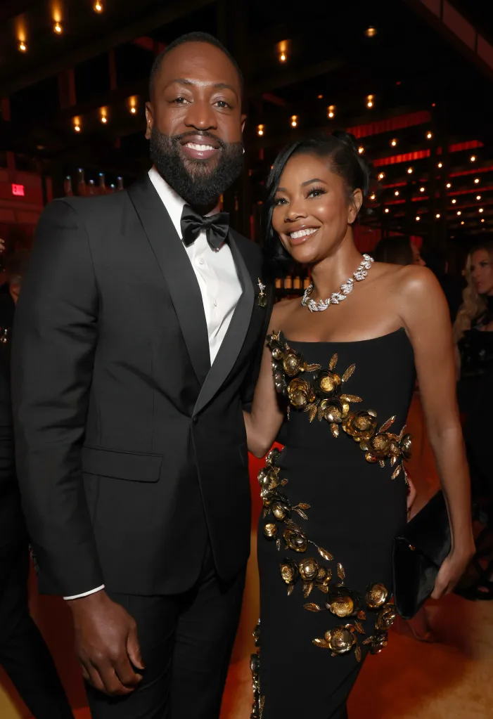 Dwyane Wade and Gabrielle Union smiling at the 2025 Vanity Fair Oscar Party.