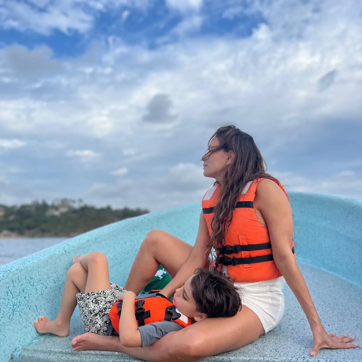 Eva Longoria and her son Santiago Bastón in a boat.