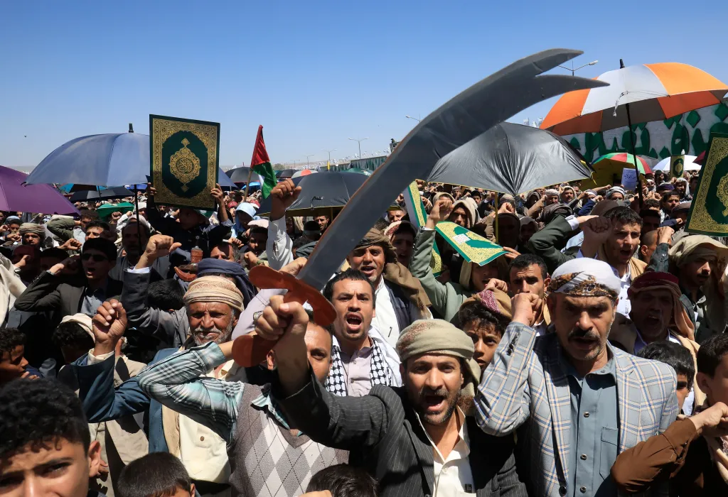 Shiite Houthi supporters chant slogans during a ceremonial rally marking Al-Ghadir Day in Sana'a, Yemen.