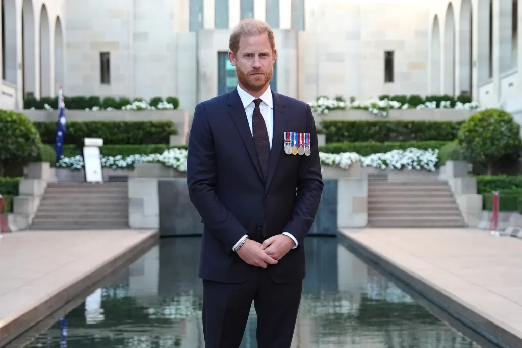 Prince Harry, Duke of Sussex, stands by the Pool of Reflection at the Australian War Memorial.
