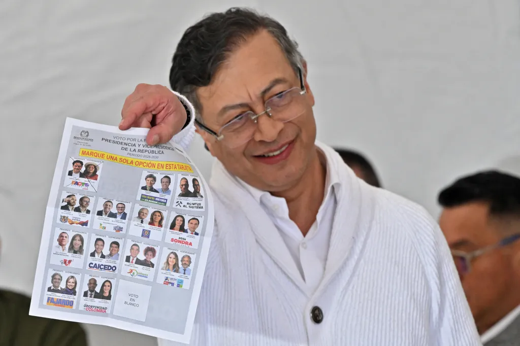 Colombia's President Gustavo Petro prepares to cast his vote during the presidential election at a polling station in Bogota on May 31, 2026. 