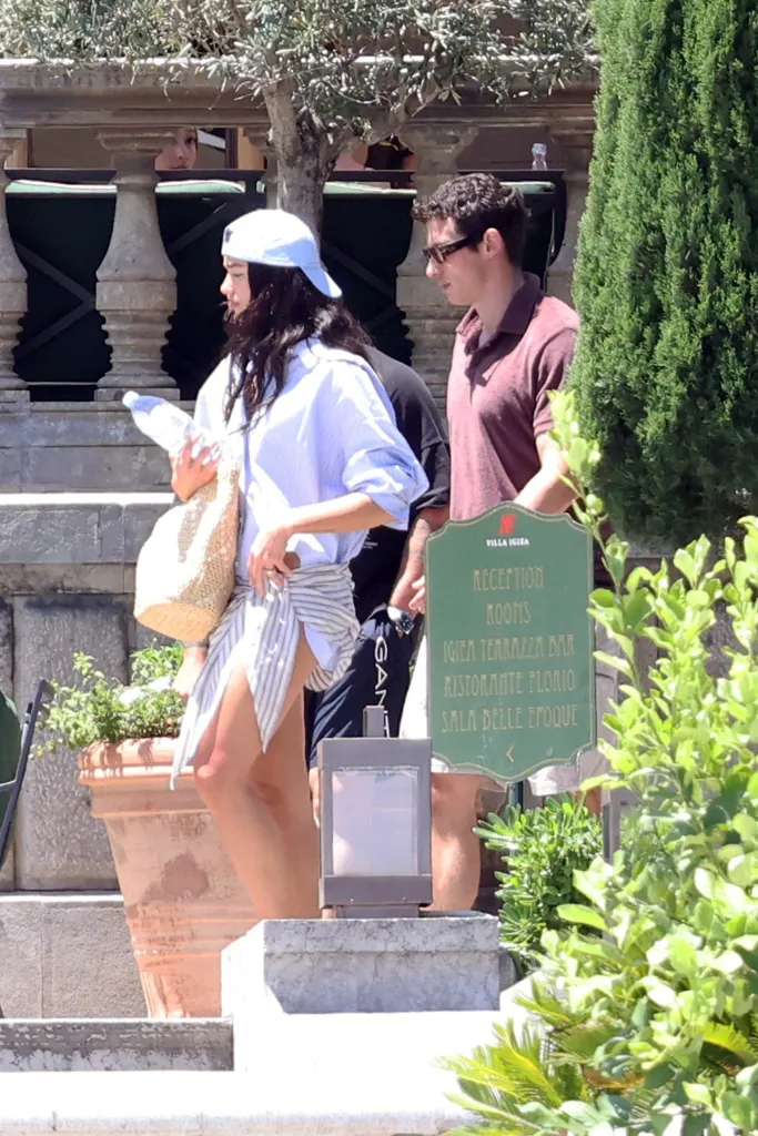 Dua Lipa and Callum Turner outside Villa Igiea in Palermo, Sicily.
