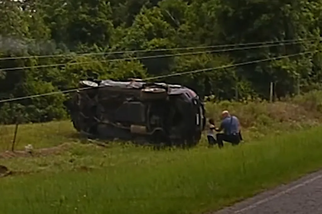 SUV flipped on its side after a crash in Camden, Arkansas.