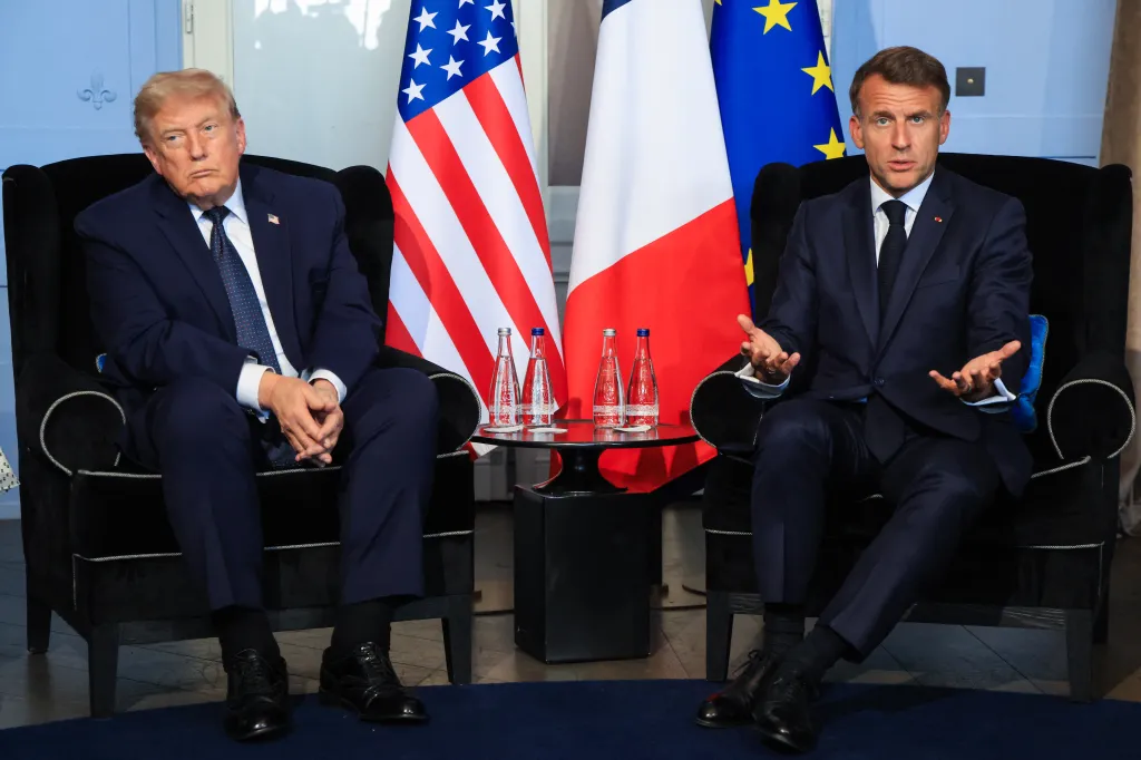 President Trump (L) attends a bilateral meeting with France's President Emmanuel Macron on the sidelines of the G7 summit, in Evian, central-eastern France on June 15, 2026.