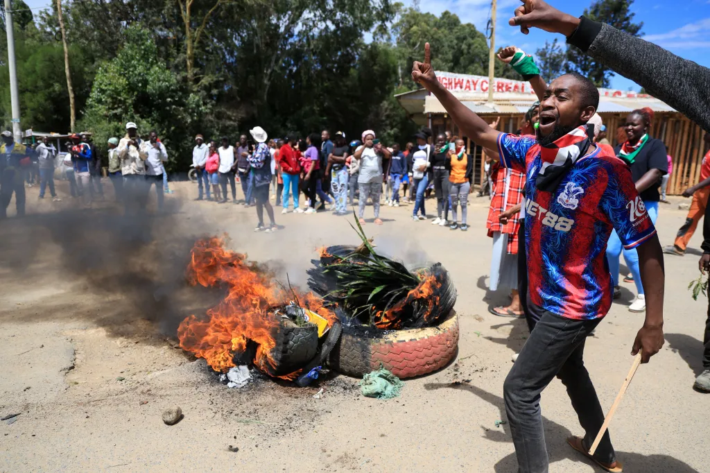 Protesters set bonfires during a demonstration against an Ebola facility in Nanyuki, Kenya.